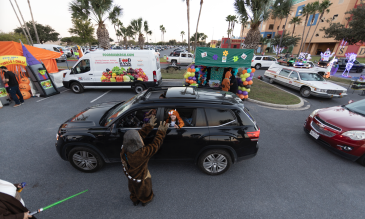 Chewbacca hands candy out for STHS Children's Trick-or-Treating event