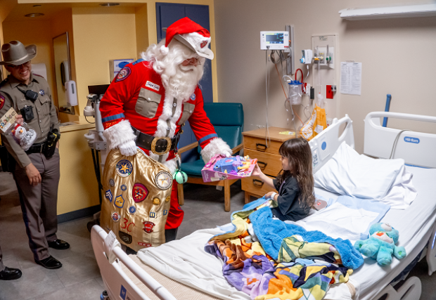 Trooper Santa visiting STHS Children's patients